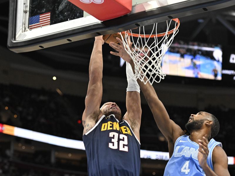 CLEVELAND, OH - DECEMBER 8: Aaron Gordon #32 of the Denver Nuggets dunks the ball during the game against the Cleveland Cavaliers on December 5, 2024 at Rocket Mortgage FieldHouse in Cleveland, Ohio. NOTE TO USER: User expressly acknowledges and agrees that, by downloading and/or using this Photograph, user is consenting to the terms and conditions of the Getty Images License Agreement. Mandatory Copyright Notice: Copyright 2024 NBAE (Photo by David Liam Kyle/NBAE via Getty Images)