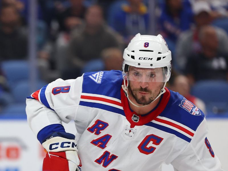 Oct 9, 2025; Buffalo, New York, USA;  New York Rangers center J.T. Miller (8) looks for the puck on a face-off during the third period against the Buffalo Sabres at KeyBank Center. Mandatory Credit: Timothy T. Ludwig-Imagn Images