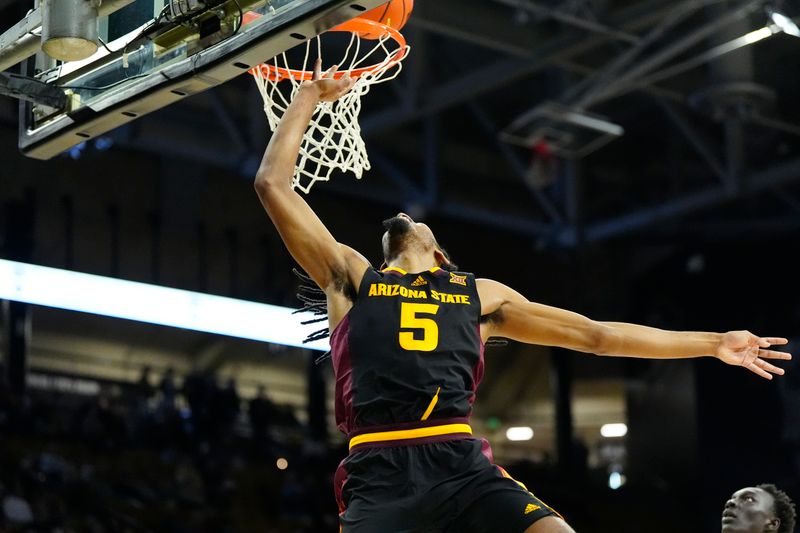 Jan 28, 2025; Boulder, Colorado, USA; Arizona State Sun Devils guard Amier Ali (5) shoots the ball in the first half against the Colorado Buffaloes at CU Events Center. Mandatory Credit: Ron Chenoy-Imagn Images