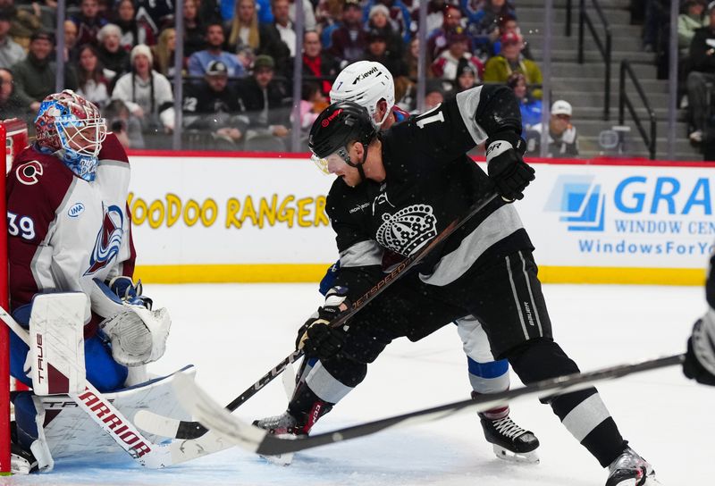 Dec 29, 2025; Denver, Colorado, USA; Colorado Avalanche goaltender Mackenzie Blackwood (39) and defenseman Devon Toews (7) defend on Los Angeles Kings right wing Corey Perry (10) in the third period at Ball Arena. Mandatory Credit: Ron Chenoy-Imagn Images