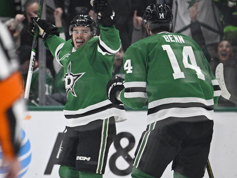 Feb 29, 2024; Dallas, Texas, USA; Dallas Stars center Logan Stankoven (11) and left wing Jamie Benn (14) celebrates a goal scored by Stankoven against the Winnipeg Jets during the first period at the American Airlines Center. Mandatory Credit: Jerome Miron-USA TODAY Sports