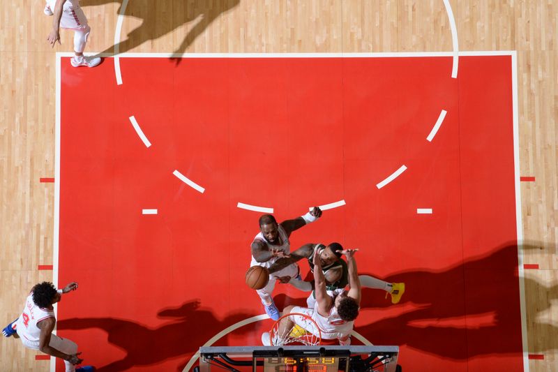 HOUSTON, TX - JANUARY 6: Damian Lillard #0 of the Milwaukee Bucks drives to the basket during the game against the Houston Rockets on January 6, 2024 at the Toyota Center in Houston, Texas. NOTE TO USER: User expressly acknowledges and agrees that, by downloading and or using this photograph, User is consenting to the terms and conditions of the Getty Images License Agreement. Mandatory Copyright Notice: Copyright 2024 NBAE (Photo by Logan Riely/NBAE via Getty Images)