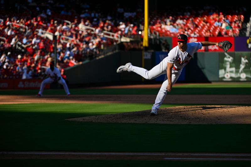 Oct 1, 2023; St. Louis, Missouri, USA;  St. Louis Cardinals relief pitcher Ryan Helsley (56) pitches against the Cincinnati Reds during the ninth inning at Busch Stadium. Mandatory Credit: Jeff Curry-USA TODAY Sports