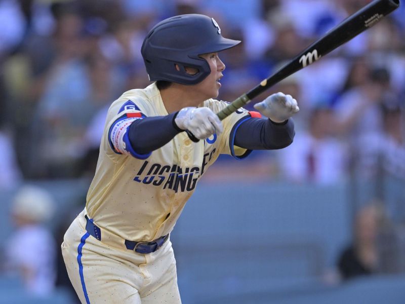 May 31, 2025; Los Angeles, California, USA; Los Angeles Dodgers second baseman Hyeseong Kim (6) singles in the fifth inning against the New York Yankees at Dodger Stadium. Mandatory Credit: Jayne Kamin-Oncea-Imagn Images