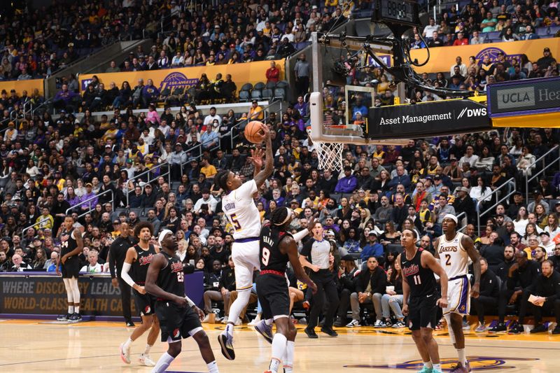 LOS ANGELES, CA - JANUARY 21:  Cam Reddish #5 of the Los Angeles Lakers goes to the basket during the game on January 21, 2024 at Crypto.Com Arena in Los Angeles, California. NOTE TO USER: User expressly acknowledges and agrees that, by downloading and/or using this Photograph, user is consenting to the terms and conditions of the Getty Images License Agreement. Mandatory Copyright Notice: Copyright 2024 NBAE (Photo by Juan Ocampo/NBAE via Getty Images)