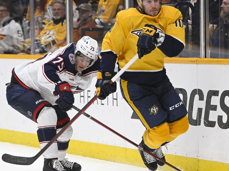 Jan 17, 2023; Nashville, Tennessee, USA;  Columbus Blue Jackets defenseman Tim Berni (75) trips Nashville Predators center Colton Sissons (10) during the third period at Bridgestone Arena. Mandatory Credit: Steve Roberts-USA TODAY Sports