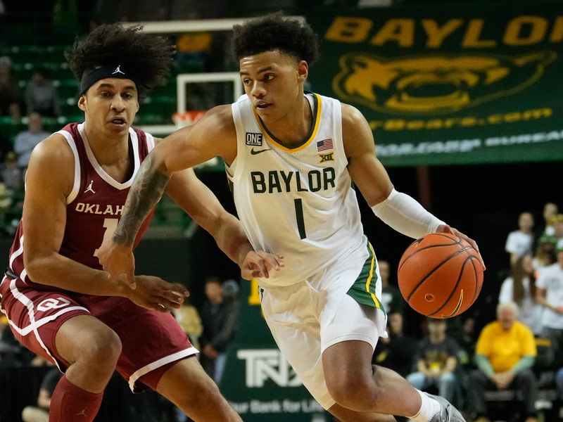 Feb 8, 2023; Waco, Texas, USA;  Baylor Bears guard Keyonte George (1) drives to the basket against Oklahoma Sooners forward Jalen Hill (1) during the first half at Ferrell Center. Mandatory Credit: Chris Jones-USA TODAY Sports