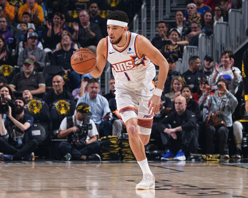 SAN FRANCISCO, CA - FEBRUARY 10: Devin Booker #1 of the Phoenix Suns dribbles the ball during the game against the Golden State Warriors on February 10, 2024 at the Chase Center in San Francisco, California. NOTE TO USER: User expressly acknowledges and agrees that, by downloading and/or using this Photograph, user is consenting to the terms and conditions of the Getty Images License Agreement. Mandatory Copyright Notice: Copyright 2024 NBAE (Photo by Garrett Ellwood/NBAE via Getty Images)