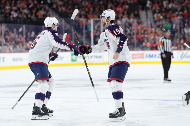 Mar 14, 2026; Philadelphia, Pennsylvania, USA; Columbus Blue Jackets center Adam Fantilli (19) reacts with defenseman Egor Zamula (6) after a goal against the Philadelphia Flyers in the first period at Xfinity Mobile Arena. Mandatory Credit: Kyle Ross-Imagn Images