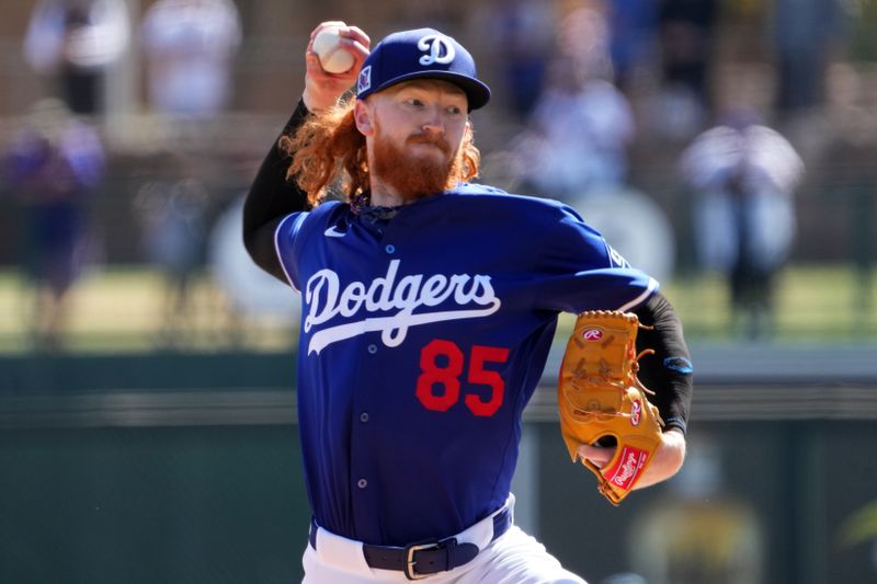 Mar 6, 2025; Phoenix, Arizona, USA; Los Angeles Dodgers pitcher Dustin May (85) pitches against the Texas Rangers during the third inning at Camelback Ranch-Glendale. Mandatory Credit: Joe Camporeale-Imagn Images