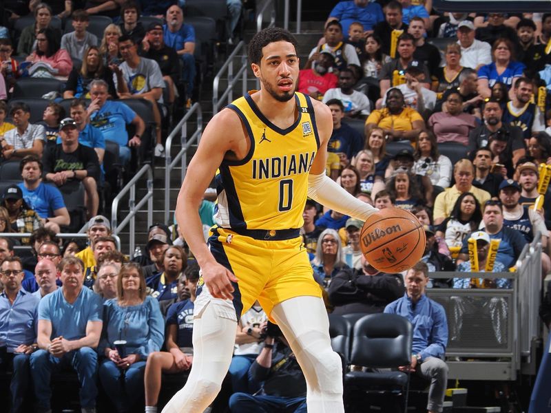 INDIANAPOLIS, IN - APRIL 14: Tyrese Haliburton #0 of the Indiana Pacers dribbles the ball during the game against the Atlanta Hawks on April 14, 2024 at Gainbridge Fieldhouse in Indianapolis, Indiana. NOTE TO USER: User expressly acknowledges and agrees that, by downloading and or using this Photograph, user is consenting to the terms and conditions of the Getty Images License Agreement. Mandatory Copyright Notice: Copyright 2024 NBAE (Photo by Ron Hoskins/NBAE via Getty Images)