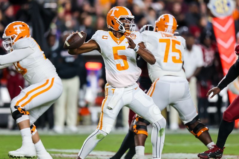 Nov 19, 2022; Columbia, South Carolina, USA; Tennessee Volunteers quarterback Hendon Hooker (5) throws a pass against the South Carolina Gamecocks in the second half at Williams-Brice Stadium. Mandatory Credit: Jeff Blake-USA TODAY Sports