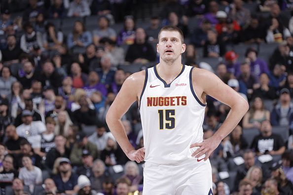 SACRAMENTO, CA - DECEMBER 2: Nikola Jokic #15 of the Denver Nuggets looks on during the game against the Sacramento Kings on December 2, 2023 at Golden 1 Center in Sacramento, California. NOTE TO USER: User expressly acknowledges and agrees that, by downloading and or using this Photograph, user is consenting to the terms and conditions of the Getty Images License Agreement. Mandatory Copyright Notice: Copyright 2023 NBAE (Photo by Rocky Widner/NBAE via Getty Images)