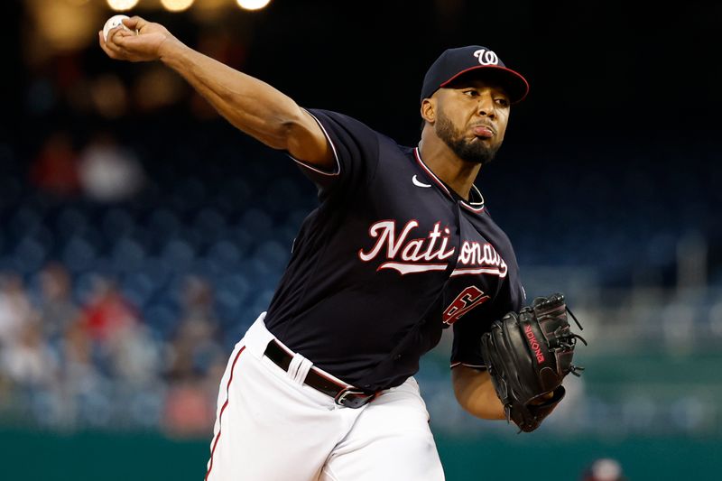 Sep 18, 2023; Washington, District of Columbia, USA; Washington Nationals starting pitcher Joan Adon (60) pitches against the Chicago White Sox during the first inning at Nationals Park. Mandatory Credit: Geoff Burke-USA TODAY Sports