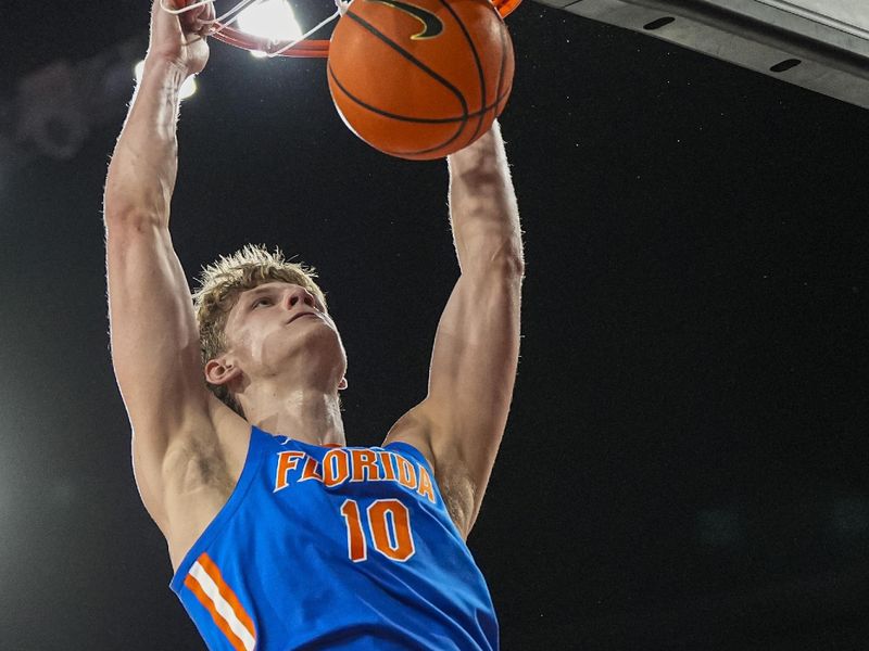 Feb 11, 2026; Athens, Georgia, USA; Florida Gators forward Thomas Haugh (10) dunks the ball against the Georgia Bulldogs during the second half at Stegeman Coliseum. Mandatory Credit: Dale Zanine-Imagn Images
