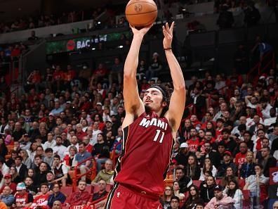 MIAMI, FL - DECEMBER 25:  Jaime Jaquez Jr. #11 of the Miami Heat shoots the ball during the game against the Philadelphia 76ers on December 25, 2023 at Kaseya Center in Miami, Florida. NOTE TO USER: User expressly acknowledges and agrees that, by downloading and or using this Photograph, user is consenting to the terms and conditions of the Getty Images License Agreement. Mandatory Copyright Notice: Copyright 2023 NBAE (Photo by David Sherman/NBAE via Getty Images)