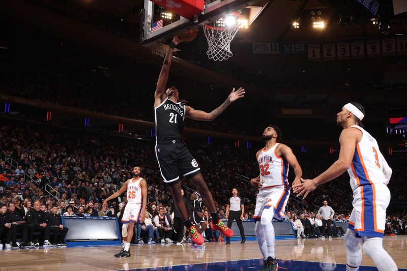 NEW YORK, NY - NOVEMBER 17: Noah Clowney #21 of the Brooklyn Nets drives to the basket during the game against the New York Knicks on November 17, 2024 at Madison Square Garden in New York City, New York.  NOTE TO USER: User expressly acknowledges and agrees that, by downloading and or using this photograph, User is consenting to the terms and conditions of the Getty Images License Agreement. Mandatory Copyright Notice: Copyright 2024 NBAE  (Photo by Nathaniel S. Butler/NBAE via Getty Images)