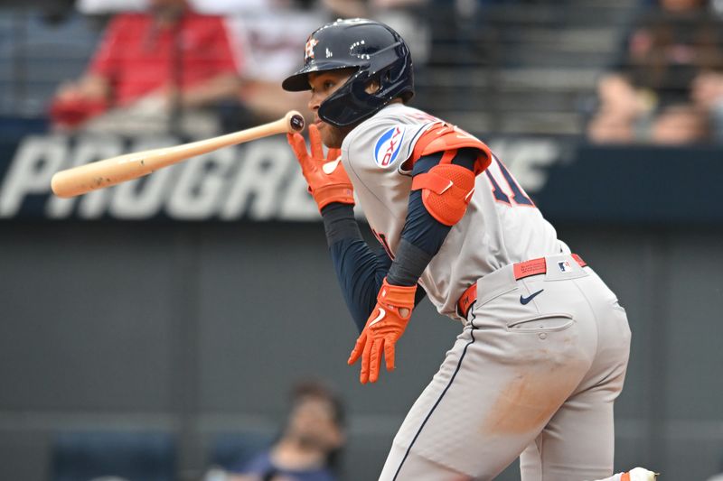 Jun 8, 2025; Cleveland, Ohio, USA; Houston Astros right fielder Cam Smith (11) hits an RBI double during the seventh inning against the Cleveland Guardians at Progressive Field. Mandatory Credit: Ken Blaze-Imagn Images
