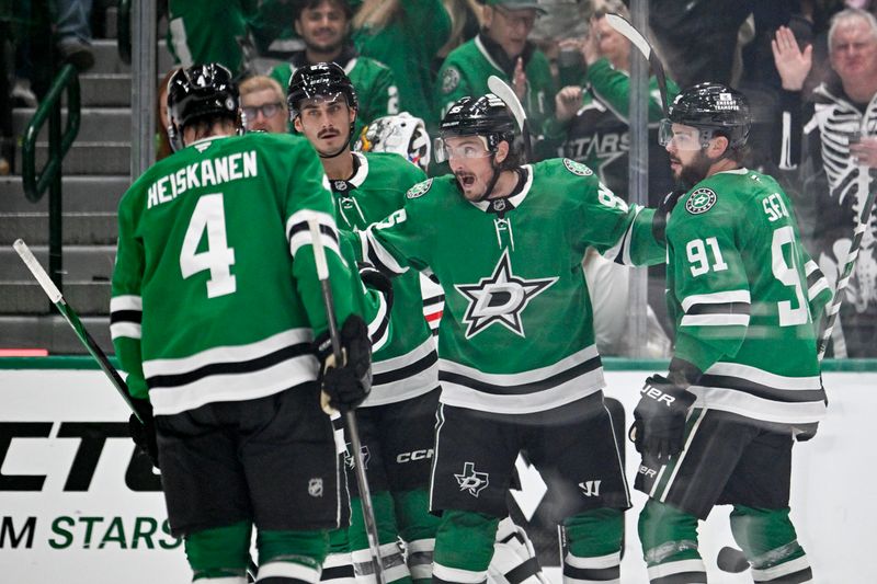 Oct 26, 2024; Dallas, Texas, USA; Dallas Stars defenseman Miro Heiskanen (4) and left wing Mason Marchment (27) and center Matt Duchene (95) and center Tyler Seguin (91) celebrates a goal scored by Duchene against the Chicago Blackhawks during the third period at the American Airlines Center. Mandatory Credit: Jerome Miron-Imagn Images