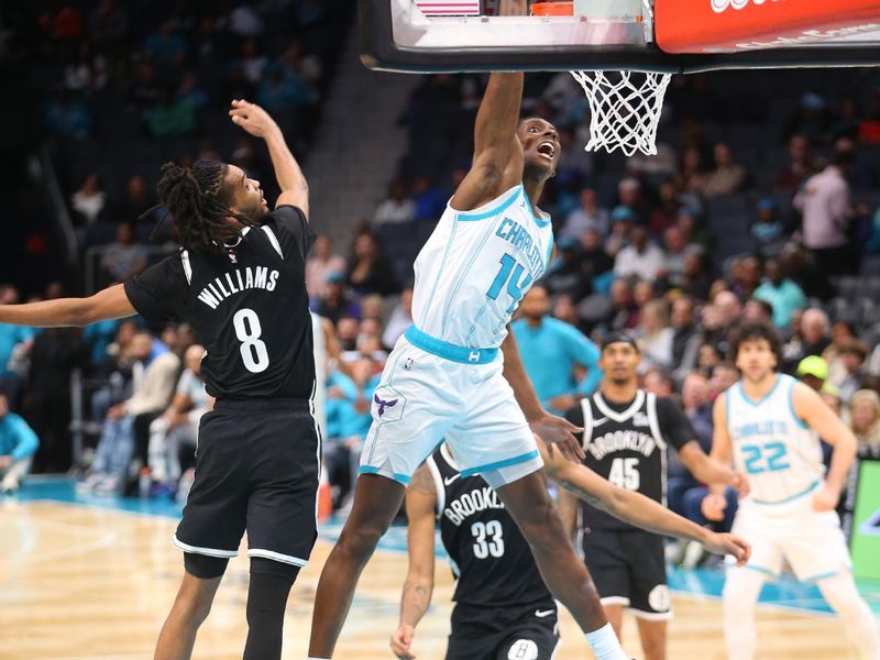 CHARLOTTE, NC - JANUARY 29:  Moussa Diabate #14 of the Charlotte Hornets dunks the ball during the game against the Brooklyn Nets on January 29, 2025 at Spectrum Center in Charlotte, North Carolina. NOTE TO USER: User expressly acknowledges and agrees that, by downloading and or using this photograph, User is consenting to the terms and conditions of the Getty Images License Agreement. Mandatory Copyright Notice: Copyright 2025 NBAE (Photo by Kent Smith/NBAE via Getty Images)