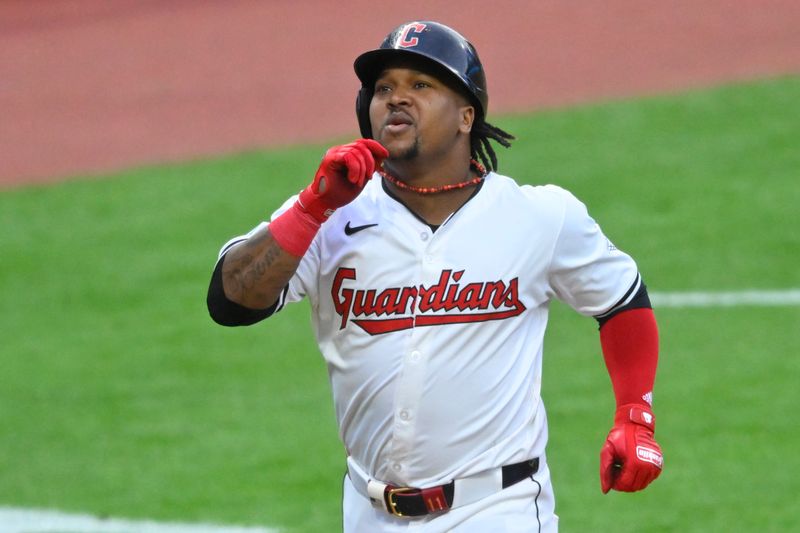 May 6, 2024; Cleveland, Ohio, USA; Cleveland Guardians third baseman Jose Ramirez (11) celebrates his solo home run in the sixth inning against the Detroit Tigers at Progressive Field. Mandatory Credit: David Richard-USA TODAY Sports