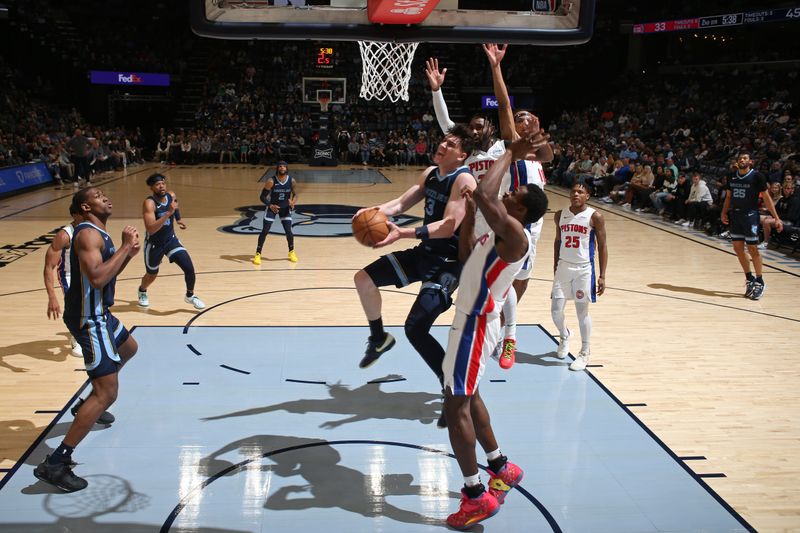 MEMPHIS, TN - APRIL 5: Jake LaRavia #3 of the Memphis Grizzlies drives to the basket during the game against the Detroit Pistons on April 5, 2024 at FedExForum in Memphis, Tennessee. NOTE TO USER: User expressly acknowledges and agrees that, by downloading and or using this photograph, User is consenting to the terms and conditions of the Getty Images License Agreement. Mandatory Copyright Notice: Copyright 2024 NBAE (Photo by Joe Murphy/NBAE via Getty Images)