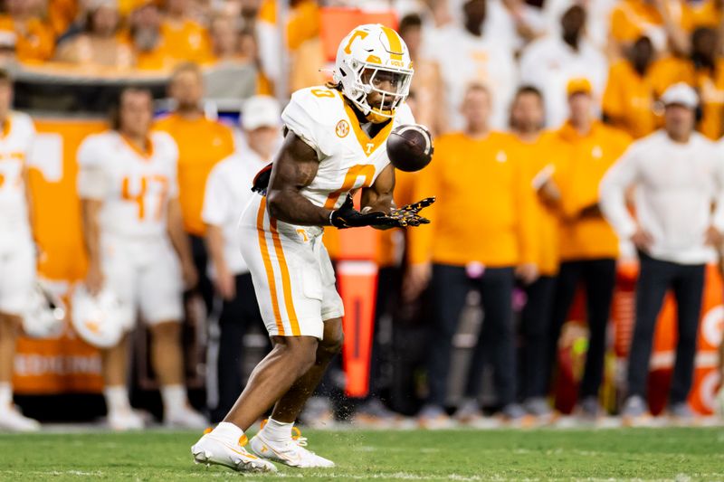 Sep 16, 2023; Gainesville, Florida, USA; Tennessee Volunteers running back Jaylen Wright (0) catches the ball during the first half against the Florida Gators at Ben Hill Griffin Stadium. Mandatory Credit: Matt Pendleton-USA TODAY Sports