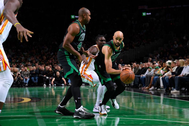 BOSTON, MA - NOVEMBER 12: Derrick White #9 of the Boston Celtics drives to the basket during the game against the Atlanta Hawks during the Emirates NBA Cup game on November 12, 2024 at TD Garden in Boston, Massachusetts. NOTE TO USER: User expressly acknowledges and agrees that, by downloading and/or using this Photograph, user is consenting to the terms and conditions of the Getty Images License Agreement. Mandatory Copyright Notice: Copyright 2024 NBAE (Photo by Brian Babineau/NBAE via Getty Images)