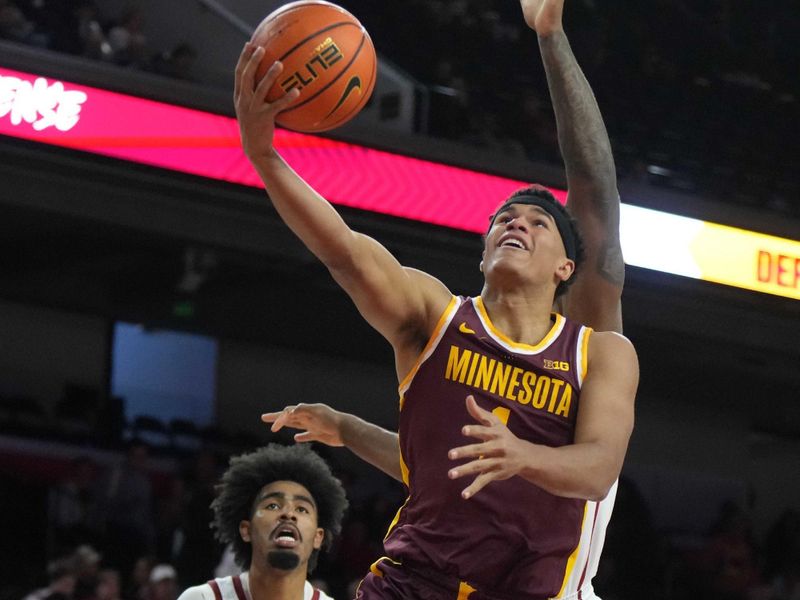 Feb 15, 2025; Los Angeles, California, USA; Minnesota Golden Gophers guard Isaac Asuma (1) shoots the ball against the Southern California Trojans in the first half at Galen Center. Mandatory Credit: Kirby Lee-Imagn Images