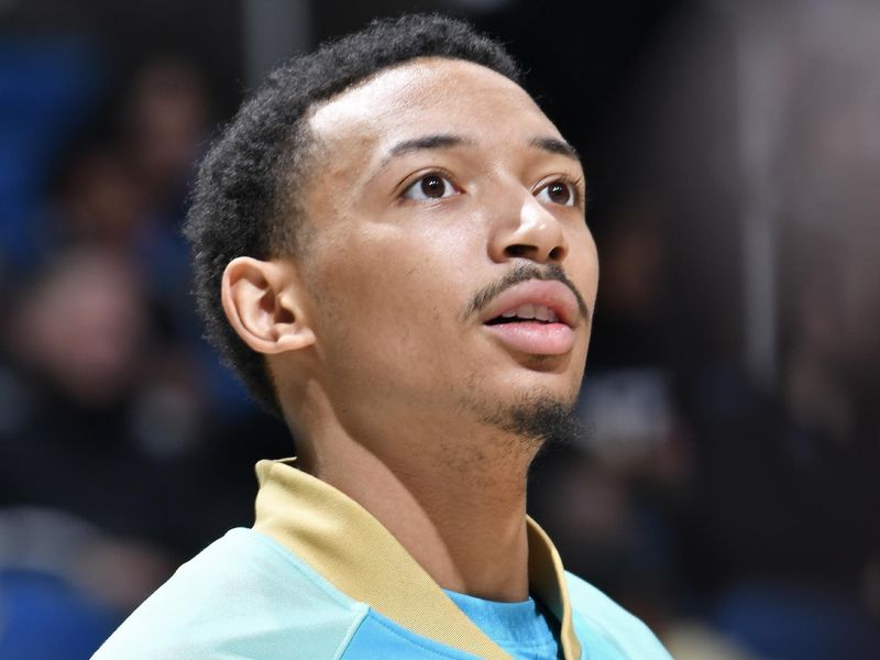 ORLANDO, FL - MARCH 19: Nick Smith Jr. #8 of the Charlotte Hornets looks on before the game against the Orlando Magic on March 19, 2024 at the Kia Center in Orlando, Florida. NOTE TO USER: User expressly acknowledges and agrees that, by downloading and or using this photograph, User is consenting to the terms and conditions of the Getty Images License Agreement. Mandatory Copyright Notice: Copyright 2024 NBAE (Photo by Fernando Medina/NBAE via Getty Images)