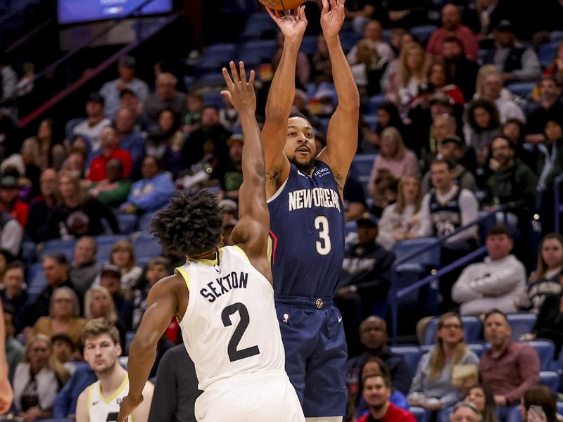 NEW ORLEANS, LOUISIANA - JANUARY 17: CJ McCollum #3 of the New Orleans Pelicans shoots over Collin Sexton #2 of the Utah Jazz during the first half of a game at the Smoothie King Center on January 17, 2025 in New Orleans, Louisiana. NOTE TO USER: User expressly acknowledges and agrees that, by downloading and or using this photograph, User is consenting to the terms and conditions of the Getty Images License Agreement. (Photo by Derick E. Hingle/Getty Images)