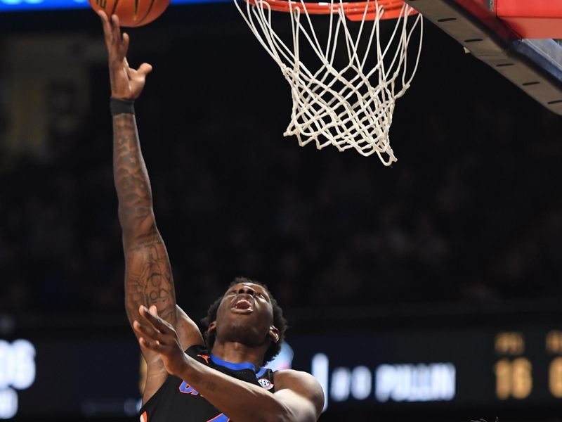 Mar 9, 2024; Nashville, Tennessee, USA; Florida Gators forward Tyrese Samuel (4) scores during the second half against the Vanderbilt Commodores at Memorial Gymnasium. Mandatory Credit: Christopher Hanewinckel-USA TODAY Sports