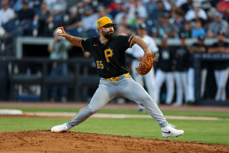 Mar 9, 2026; Tampa, Florida, USA; Pittsburgh Pirates starting pitcher Jose Urquidy (65) throws a pitch against the New York Yankees in the third inning during spring training at George M. Steinbrenner Field. Mandatory Credit: Nathan Ray Seebeck-Imagn Images