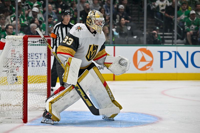 May 5, 2024; Dallas, Texas, USA; Vegas Golden Knights goaltender Adin Hill (33) faces the Dallas Stars attack during the second period in game seven of the first round of the 2024 Stanley Cup Playoffs at American Airlines Center. Mandatory Credit: Jerome Miron-USA TODAY Sports