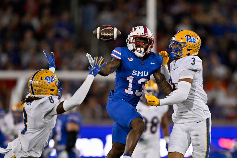 Nov 2, 2024; Dallas, Texas, USA; Pittsburgh Panthers defensive back Tamon Lynum (8) and defensive back Donovan McMillon (3) and Southern Methodist Mustangs wide receiver Roderick Daniels Jr. (13) battle for the loose ball during the first half at Gerald J. Ford Stadium. Mandatory Credit: Jerome Miron-Imagn Images