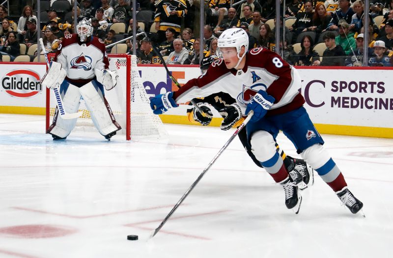 Oct 26, 2023; Pittsburgh, Pennsylvania, USA; Colorado Avalanche defenseman Cale Makar (8) carries the puck against the Pittsburgh Penguins during the first period at PPG Paints Arena. Mandatory Credit: Charles LeClaire-USA TODAY Sports