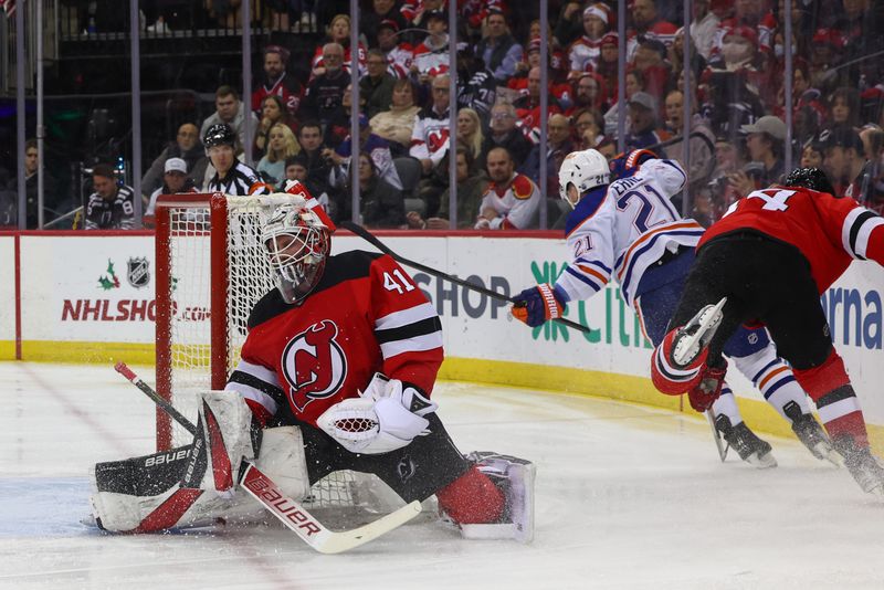 Dec 21, 2023; Newark, New Jersey, USA; Edmonton Oilers left wing Adam Erne (21) celebrates his goal against the New Jersey Devils during the third period at Prudential Center. Mandatory Credit: Ed Mulholland-USA TODAY Sports