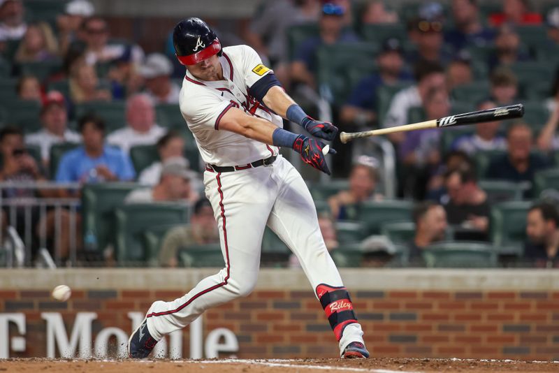 Aug 1, 2024; Atlanta, Georgia, USA; Atlanta Braves third baseman Austin Riley (27) loses the bat on a strikeout against the Miami Marlins in the fifth inning at Truist Park. Mandatory Credit: Brett Davis-USA TODAY Sports
