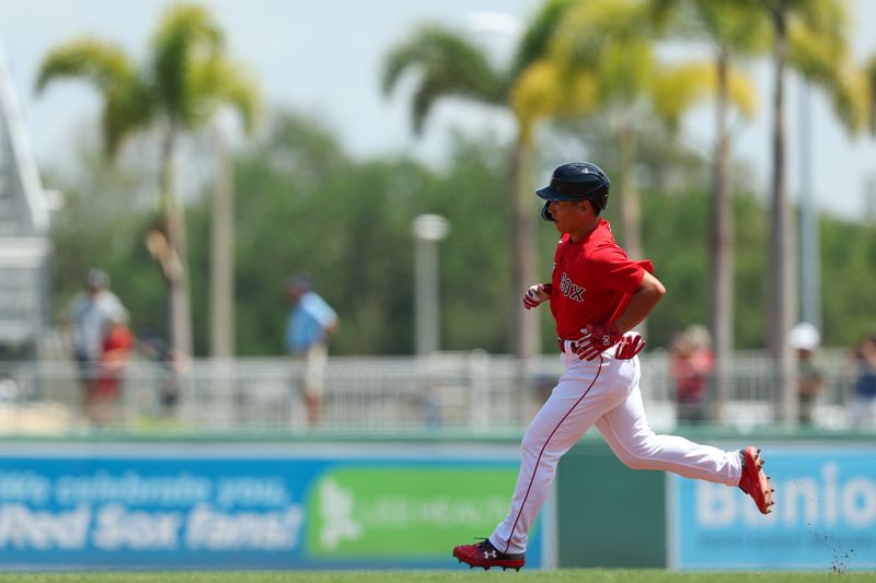 Mar 28, 2023; Fort Myers, Florida, USA;  Boston Red Sox left fielder Masataka Yoshida (7) runs the bases after hitting a two-run home run against the Atlanta Braves in the first inning during spring training at JetBlue Park at Fenway South. Mandatory Credit: Nathan Ray Seebeck-USA TODAY Sports