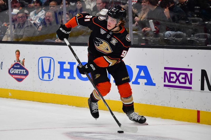 Jan 31, 2024; Anaheim, California, USA; Anaheim Ducks center Leo Carlsson (91) moves the puck against the San Jose Sharks during the second period at Honda Center. Mandatory Credit: Gary A. Vasquez-USA TODAY Sports