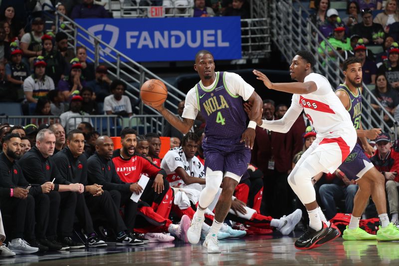 NEW ORLEANS, LA - NOVEMBER 27: Javonte Green #4 of the New Orleans Pelicans looks to pass the ball during the game against the Toronto Raptors  during a regular season game on November 27, 2024 at the Smoothie King Center in New Orleans, Louisiana. NOTE TO USER: User expressly acknowledges and agrees that, by downloading and or using this Photograph, user is consenting to the terms and conditions of the Getty Images License Agreement. Mandatory Copyright Notice: Copyright 2024 NBAE (Photo by Layne Murdoch Jr./NBAE via Getty Images)