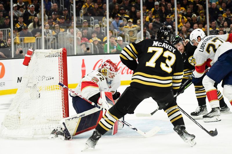 May 17, 2024; Boston, Massachusetts, USA; Boston Bruins defenseman Charlie McAvoy (73) handles the puck in front of Florida Panthers goaltender Sergei Bobrovsky (72) during the third period in game six of the second round of the 2024 Stanley Cup Playoffs at TD Garden. Mandatory Credit: Bob DeChiara-USA TODAY Sports