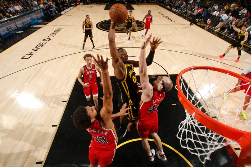 SAN FRANCISCO, CA - JANUARY 10: Jonathan Kuminga #00 of the Golden State Warriors drives to the basket during the game against the New Orleans Pelicans on January 10, 2024 at Chase Center in San Francisco, California. NOTE TO USER: User expressly acknowledges and agrees that, by downloading and or using this photograph, user is consenting to the terms and conditions of Getty Images License Agreement. Mandatory Copyright Notice: Copyright 2024 NBAE (Photo by Jed Jacobsohn/NBAE via Getty Images)