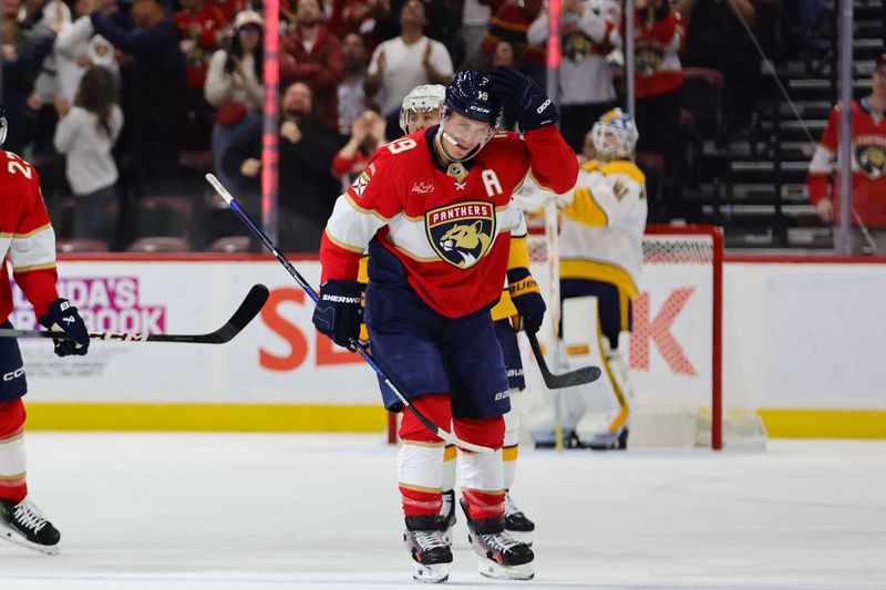 Nov 7, 2024; Sunrise, Florida, USA; Florida Panthers left wing Matthew Tkachuk (19) looks on after scoring against the Nashville Predators during the first period at Amerant Bank Arena. Mandatory Credit: Sam Navarro-Imagn Images