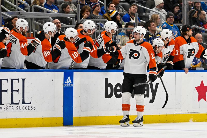 Jan 15, 2024; St. Louis, Missouri, USA;  Philadelphia Flyers center Scott Laughton (21) is congratulated by teammates after scoring against the St. Louis Blues during the second period at Enterprise Center. Mandatory Credit: Jeff Curry-USA TODAY Sports