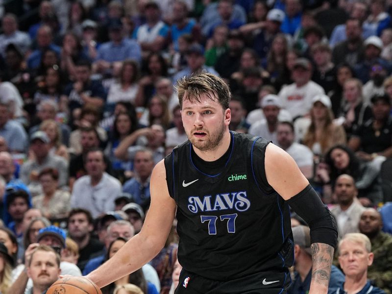 DALLAS, TX - MARCH 3: Luka Doncic #77 of the Dallas Mavericks dribbles the ball during the game against the Philadelphia 76ers on March 3, 2024 at the American Airlines Center in Dallas, Texas. NOTE TO USER: User expressly acknowledges and agrees that, by downloading and or using this photograph, User is consenting to the terms and conditions of the Getty Images License Agreement. Mandatory Copyright Notice: Copyright 2024 NBAE (Photo by Glenn James/NBAE via Getty Images)