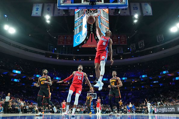 PHILADELPHIA, PENNSYLVANIA - DECEMBER 8: De'Anthony Melton #8 of the Philadelphia 76ers dunks the ball against the Atlanta Hawks in the fourth quarter at the Wells Fargo Center on December 8, 2023 in Philadelphia, Pennsylvania. The 76ers defeated the Hawks 125-114. NOTE TO USER: User expressly acknowledges and agrees that, by downloading and or using this photograph, User is consenting to the terms and conditions of the Getty Images License Agreement. (Photo by Mitchell Leff/Getty Images)