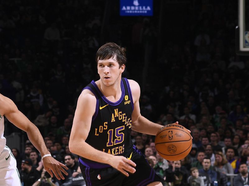 BOSTON, MA - FEBRUARY 1:  Austin Reaves #15 of the Los Angeles Lakers handles the ball during the game  against the Boston Celtics on February 1, 2024 at the TD Garden in Boston, Massachusetts. NOTE TO USER: User expressly acknowledges and agrees that, by downloading and or using this photograph, User is consenting to the terms and conditions of the Getty Images License Agreement. Mandatory Copyright Notice: Copyright 2024 NBAE  (Photo by Brian Babineau/NBAE via Getty Images)