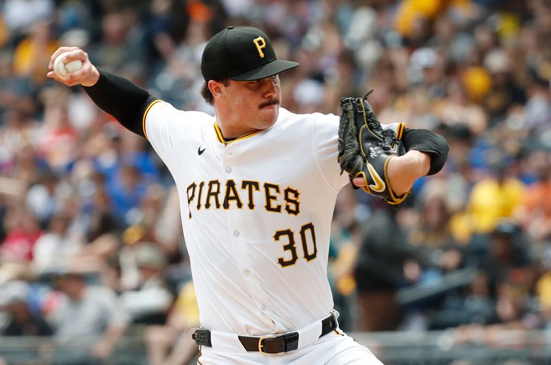 May 23, 2024; Pittsburgh, Pennsylvania, USA; Pittsburgh Pirates starting pitcher Paul Skenes (30) pitches against the San Francisco Giants during the third inning at PNC Park. Mandatory Credit: Charles LeClaire-USA TODAY Sports