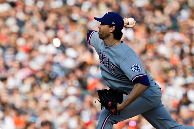 May 10, 2025; Detroit, Michigan, USA;  Texas Rangers starting pitcher Jacob deGrom (48)) pitches in the first inning against the Detroit Tigers at Comerica Park. Mandatory Credit: Rick Osentoski-Imagn Images
